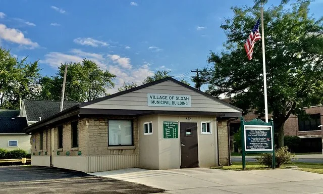 Sloan Municipal Building, 425 Reiman Street at Halstead Avenue, Sloan, New York, August 2020. Though it's centrally located in the heart of the village, the current home of Sloan'...