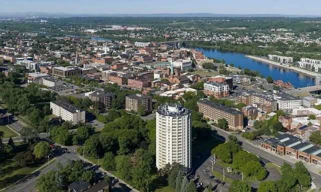 Skyline of Troy, New York (pop. 51,401). It's a historic Hudson River city known for its 19th-century architecture and former industrial economy in iron, steel, & textiles.