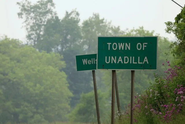 A sign for the town of Unadilla, New York, on NY-7, June 6, 2023.