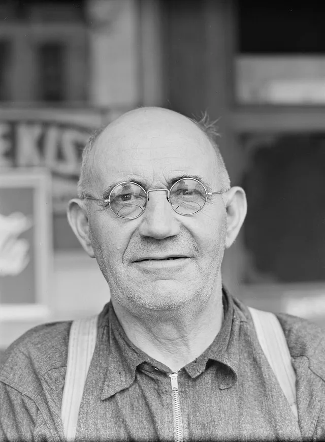 Mr. Merton Hoover, postmaster, sixty-three years old, who loses his position through the wiping out of the town of Sterlingville, New York, in the Pine Camp expansion area. He is...