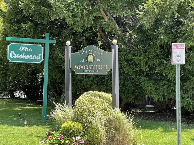A Woodsburgh welcome sign an an entrance to the Inc. Village of Wodsburgh, NY on August 8, 2022.