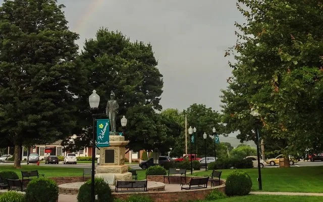 view of Burnsville Town Square, looking east. Statue is Captain Otway Burns, namesake of the town.