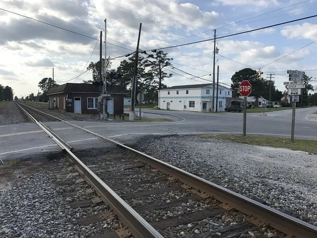 Crossroads and railroad track in Cove City