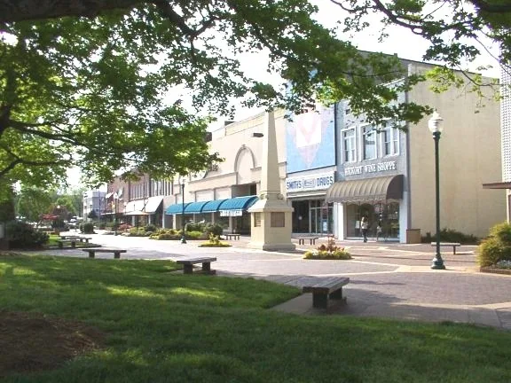 Hickory, North Carolina. Union Square is the center of Hickory. This photo from the spring of 2002 looks NW to Smith Drugs, Hickory Wine Shoppe, and the Miracle of Hickory monumen...