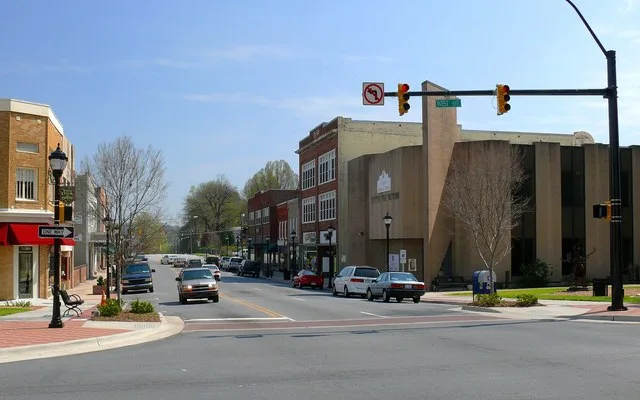 Looking south down Main Street from the town square in downtown Lenoir . Photo taken with a Panasonic Lumix DMC-FZ50 in Caldwell County, NC, USA . This is an image of a place or b...