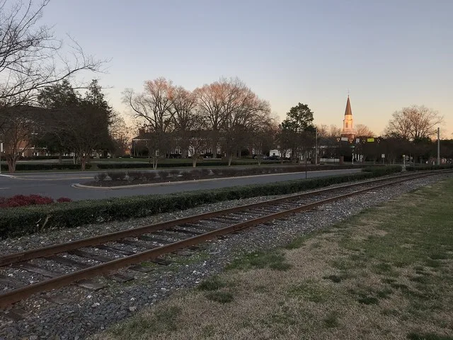 Misenheimer with Pfeiffer University buildings in the background, Norfolk Southern Railroad line in the foreground