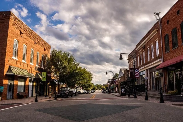 Row of buildings down White Street in Downtown Wake Forest, North Carolina, USA.