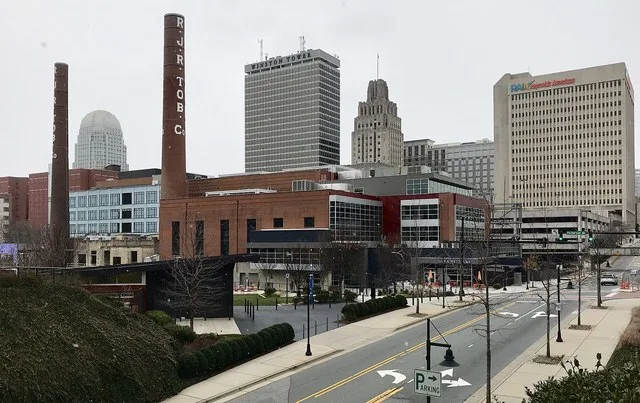 Skyline of downtown Winston-Salem with the redeveloped Bailey Power Plant in the foreground and 100 North Main Street, Winston Tower, the Reynolds Building, and the Reynolds Ameri...