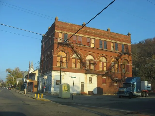 Eastern side of the building on the northwestern corner of the intersection of Main and Church Streets in downtown Addyston , Ohio , United States . This building and those around...