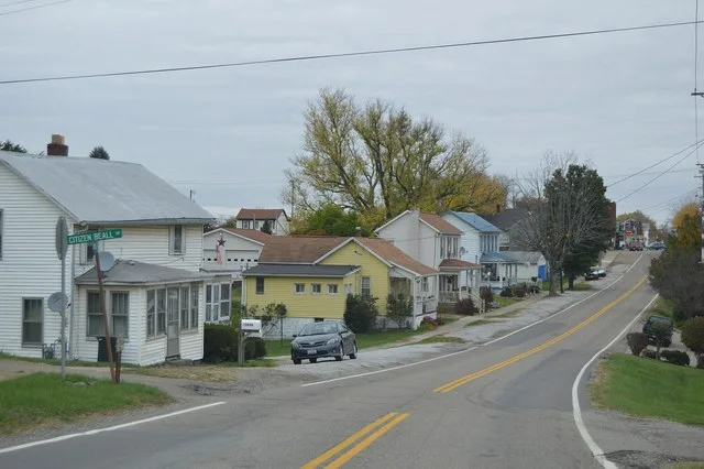 Houses on the northern side of Ohio Avenue ( State Route 145 ) in western Beallsville , Ohio , United States .