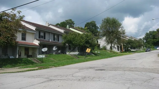 Houses on the northern side of Jackson Street east of the Chambers Street intersection in Campbell , Ohio , United States . Built by Youngstown Sheet and Tube as residences for it...