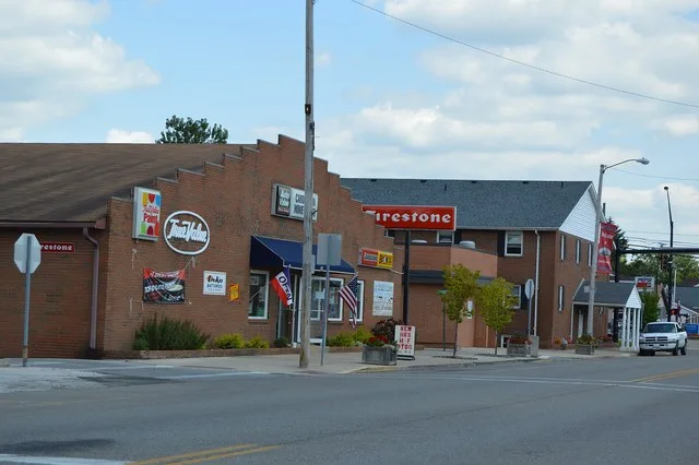 Buildings on the northern side of Main Street ( U.S. Route 42 ) directly east of the railroad in central Cardington , Ohio , United States .