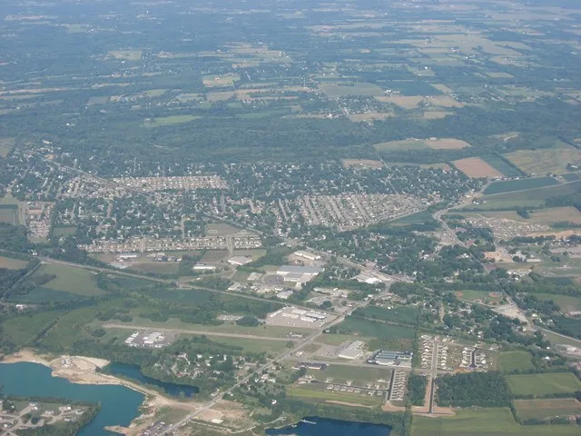 Aerial view of Carlisle , a city split between Montgomery and Warren counties in the southeastern part of the U.S. state of Ohio . Picture taken from a Diamond Eclipse light airpl...
