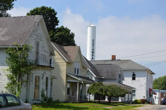 Houses on the southern side of Pleasant Street west of the Lorraine Street intersection in Catawba , Ohio , United States .