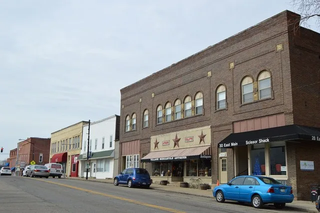 Buildings on the northwestern side of the first block of E. Main Street ( U.S. Route 36 / State Route 3 ) in downtown Centerburg , Ohio , United States .