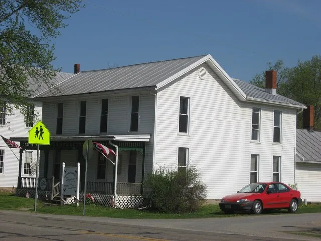 Municipal building in Chesterville , Ohio , United States , located on the northwestern corner of the intersection of E. Sandusky ( State Route 95 ) and Poplar Streets.