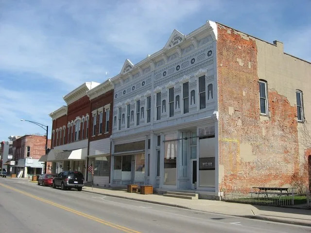 Buildings on the eastern side of the 100 block of S. High Street ( State Route 12 ) in downtown Columbus Grove , Ohio , United States .
