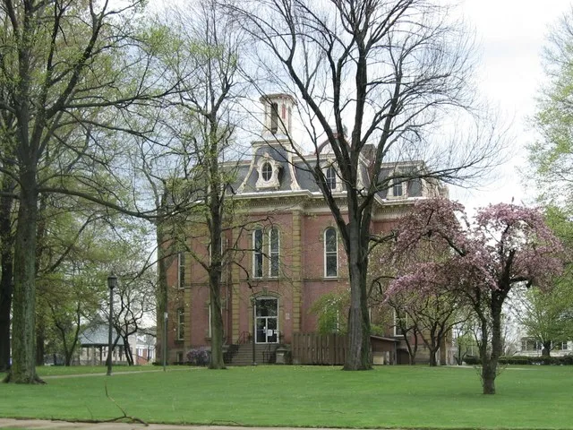 Rear of the Coshocton County Courthouse , located on the courthouse square (Chestnut, Main, Third, and Fourth Streets) in downtown Coshocton , Ohio , United States . Built in 1873...