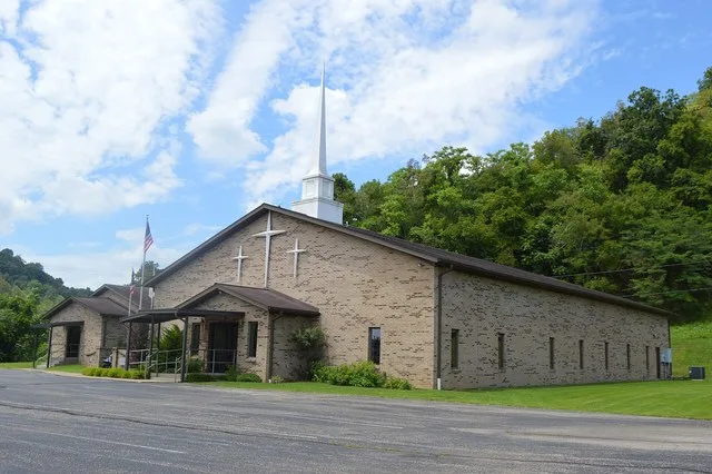 Northern side and front of the Crown City Wesleyan Church, located at 26144 State Route 7 in Crown City , Ohio , United States . Although within village limits, the church is also...