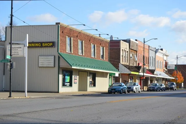 Buildings on Main Street ( U.S. Route 20 Alternate/ State Route 2 ) east of the Wilson Street intersection in Delta , Ohio , United States .