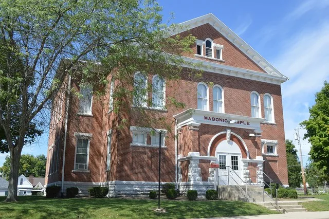 Front and southern side of the Farmersville Masonic Temple, located at the intersection of Center and Jackson Streets in Farmersville , Ohio , United States .