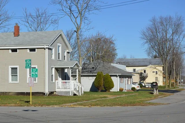 Houses on the northern side of High Street east of the Henry Street intersection in Florida , Ohio , United States .