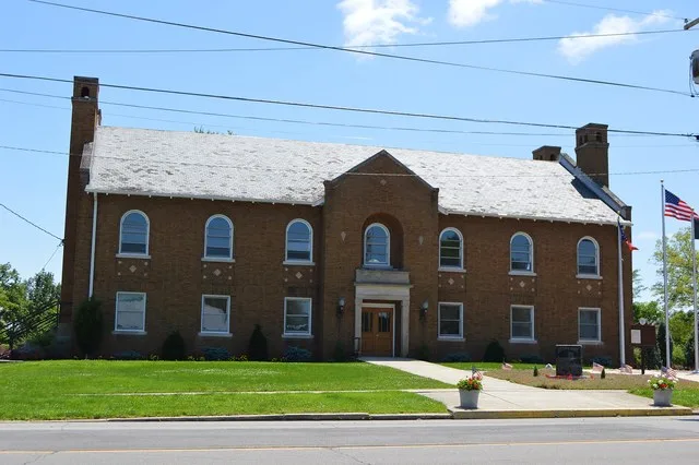 Front of the Fort Jennings Memorial Hall, located at 364 Water Street (State Routes 189 / 190 ) in Fort Jennings , Ohio , United States . Built in 1916 as a war memorial, it has s...