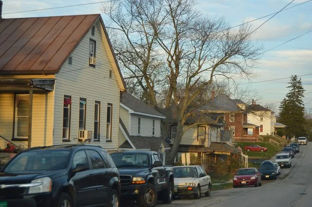 Houses on the northern side of Main Street east of the Clay Street intersection in Gettysburg , Ohio , United States .