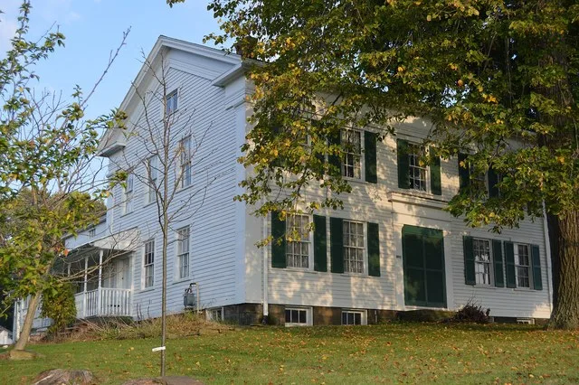 Front and northern side of the Henry Barnhisel House , located at 1011 State Street ( U.S. Route 422 ) in Girard , Ohio , United States . Built in 1840, it is listed on the Nation...