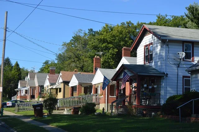 Houses on the eastern side of Hammel Avenue, seen looking north from the Chuck Harmon Way intersection, in Golf Manor , Ohio , United States .