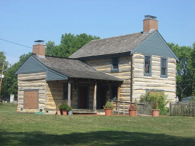 One of the Groveport Log Houses , located in a community park on the southern side of Wirt Road in Groveport , Ohio , United States . Built in 1815, this house and one other are l...