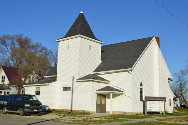 Front and southern side of the Grover Hill Bible Baptist Church, located on the northeastern corner of the intersection of Perry and Cleveland Streets in Grover Hill , Ohio , Unit...