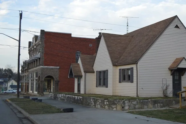 Buildings on the eastern side of Main Street ( State Route 93 ) at the Chillicothe Street intersection in Hamden , Ohio , United States .