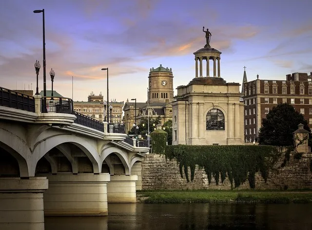 A view of downtown Hamilton Ohio, viewed from side of the High Street bridge over the Miami River including the Butler County Soldiers Monument