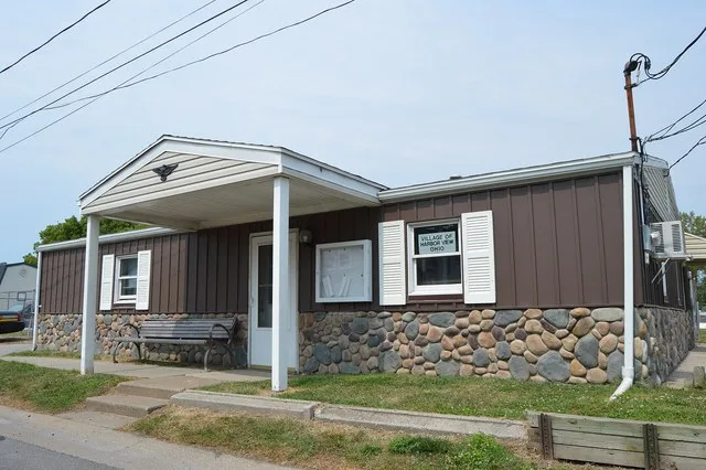Front of the municipal building in Harbor View , Ohio , United States , located at 327 Lakeview Avenue. Despite the appearance, this is a concrete-block building with a newly appl...