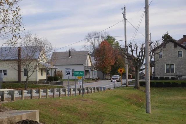 Entering Ithaca , Ohio , United States from the north on Main Street, the combined State Routes 503 and 722 .
