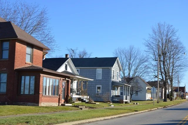 Houses on the northern side of Main Street ( State Route 37 ) east of Court Street in Junction City , Ohio , United States .