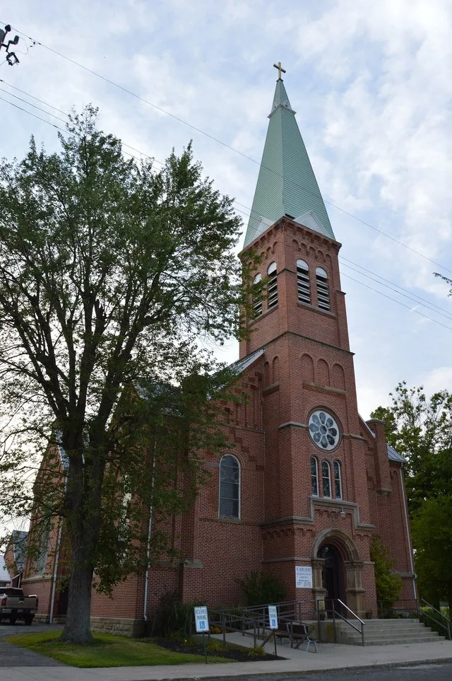 Front and southern side of St. Mary's Catholic Church, located on the western side of Main Street ( State Route 293 ) at the northern end of Kirby , Ohio , United States . It was...