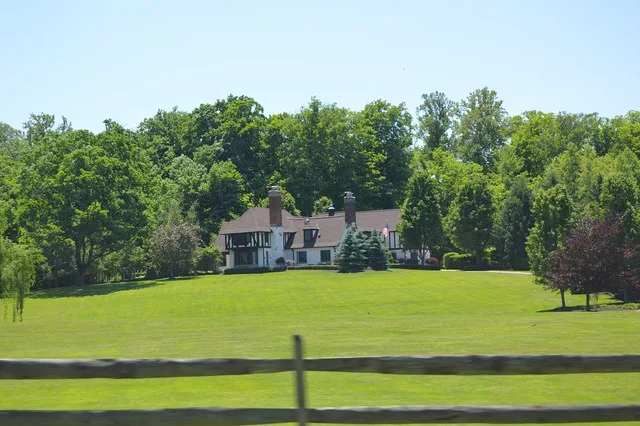 Roadside view of the great house at the Leonard C. Hanna, Jr., Estate , located on Little Mountain Road in Kirtland Hills , Ohio , United States . Built in 1924, it is listed on t...