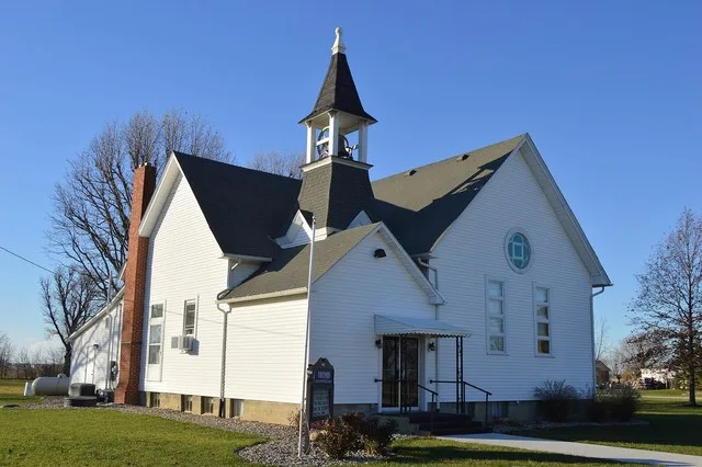 Front and southern side of Friends United Methodist Church, located at 331 Lewis Street in Latty , Ohio , United States .