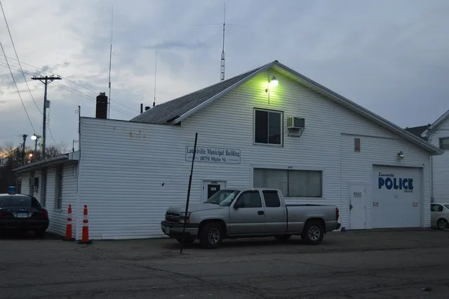 Front and southern side of the Laurelville village hall, located at 18751 Main Street in Laurelville , Ohio , United States .