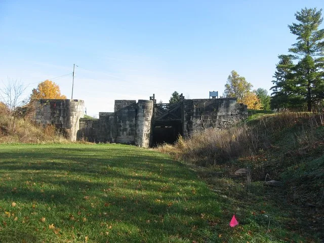 Looking up toward the bottom of the first of the Lockington Locks , located in the southwestern part of the village of Lockington , Ohio , United States . Built in 1833 as a part...