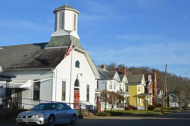 Buildings on the northern side of the 300 block of Fourth Street in Lowell , Ohio , United States .