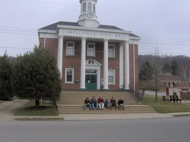 Front of the village hall in Lowellville , Ohio , United States , located at 140 E. Liberty St. Despite the inscription, Lowellville is a village by Ohio law.