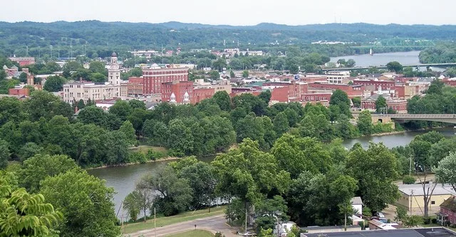 Downtown w:Marietta, Ohio , as viewed from Harmar Hill, including the w:Muskingum River (foreground) and the w:Ohio River (background right)