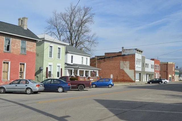 Buildings on the northern side of State Street, seen looking east from the Railroad Street intersection, in downtown Milford Center , Ohio , United States .