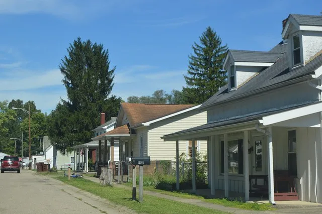 Houses on the eastern side of Liberty Street in Millville , Ohio , United States .