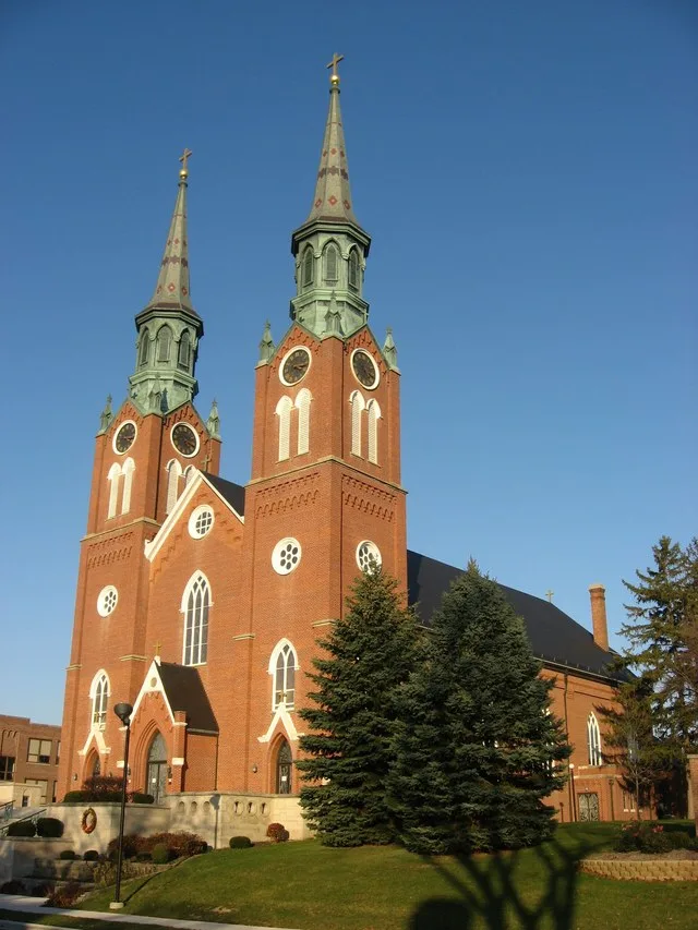 Front and southern side of St. Augustine's Catholic Church , located on N. Hanover Street in Minster , Ohio , United States . Built in 1848, the church was listed on the National...