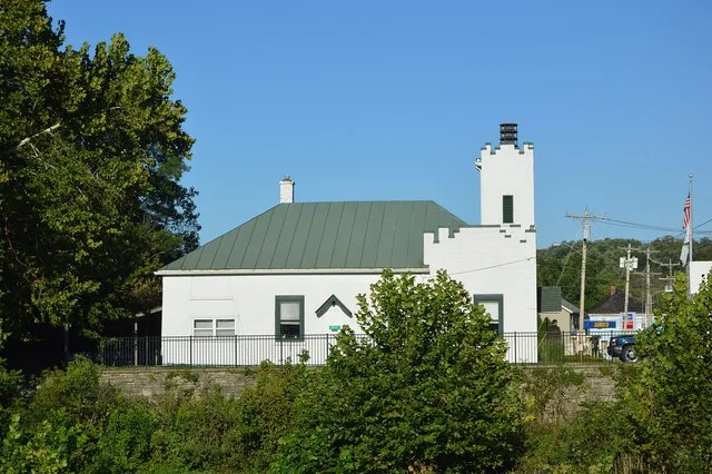 Western side of the Morrow village hall, located at 150 E. Pike Street ( U.S. Route 22 ) in Morrow , Ohio , United States .