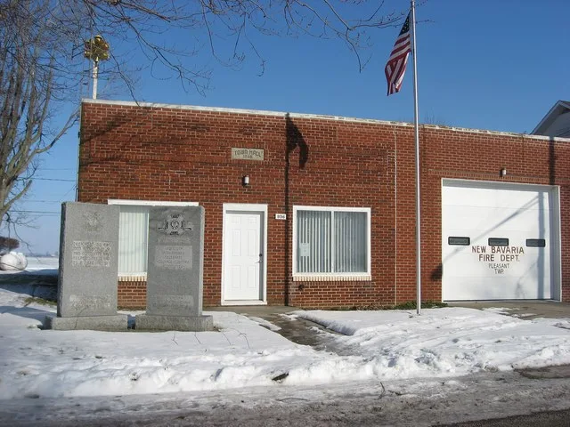 Front of the village hall and fire department in New Bavaria , Ohio , United States , located at 936 Walnut Street and built in 1946.